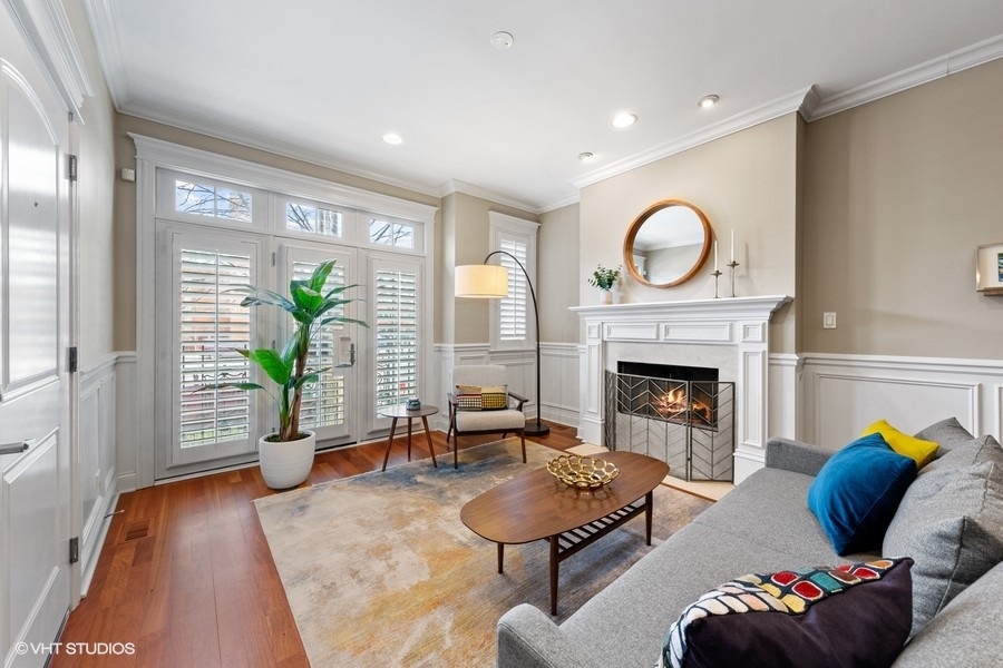 2248 North Racine Avenue, Unit 1 Chicago, IL 60614 - Photo 2 of 27 a living room with furniture and a fireplace
