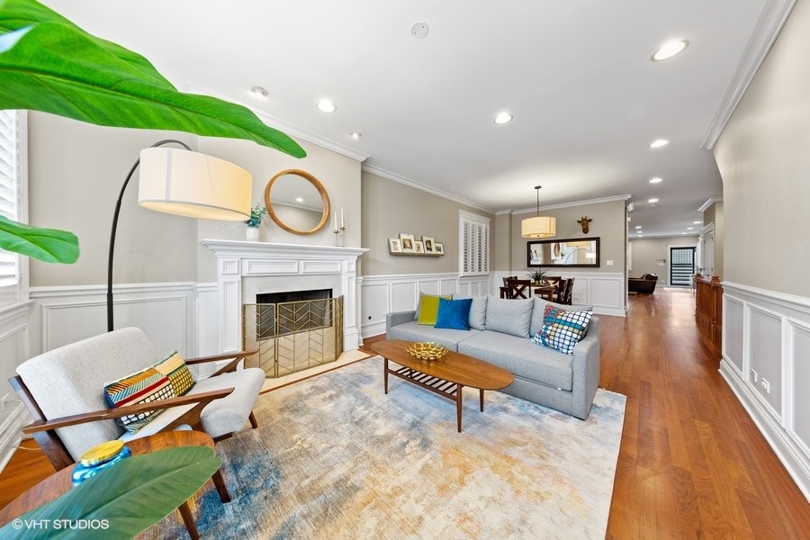 2248 North Racine Avenue, Unit 1 Chicago, IL 60614 - Photo 3 of 27 a living room with furniture and a fireplace