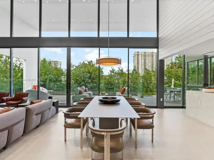 a kitchen with a table and chairs