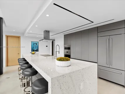 a view of a hallway with seating area