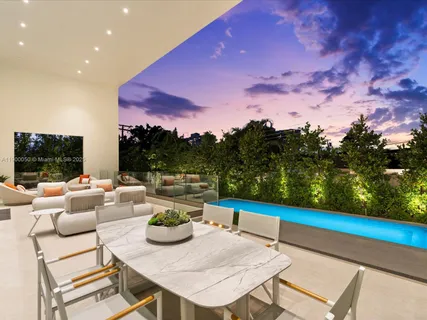 a view of a terrace with furniture