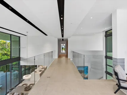 a bathroom with a double vanity sink and mirror