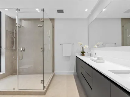 a view of a patio with couches chairs and potted plants