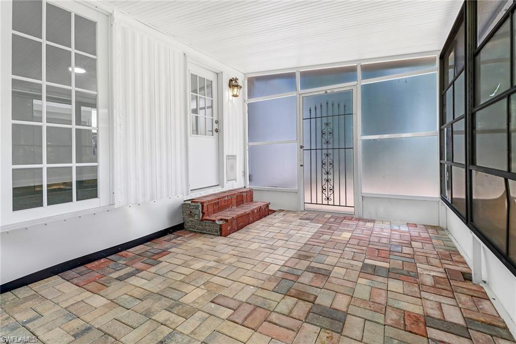 120 Grassy Key Lane, Unit 38 Naples, FL 34114 - Photo 17 of 28 a room with windows