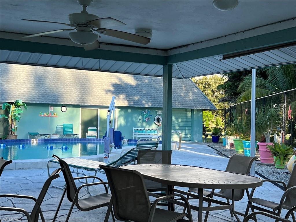 120 Grassy Key Lane, Unit 38 Naples, FL 34114 - Photo 28 of 28 a dining room with furniture and window