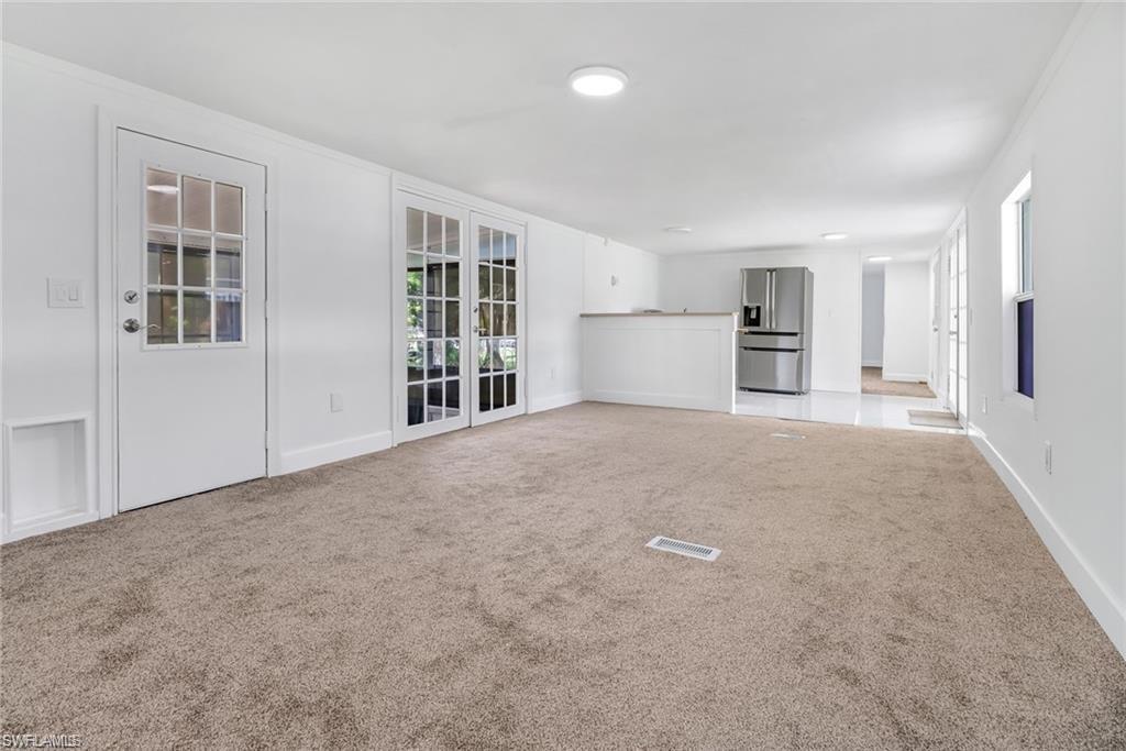 120 Grassy Key Lane, Unit 38 Naples, FL 34114 - Photo 6 of 28 a big room with closet and windows