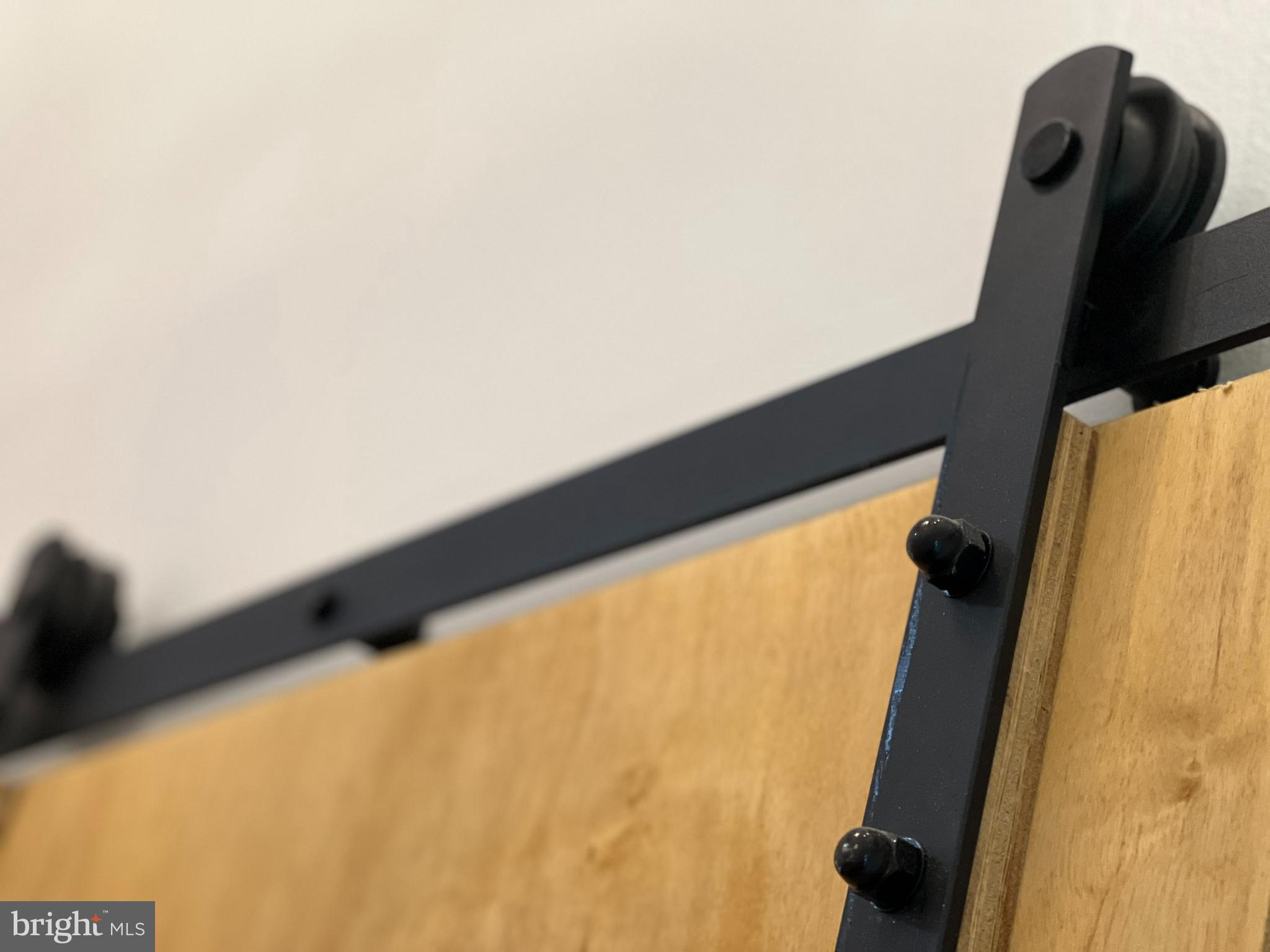 1805 Batten Hollow Road Vienna, VA 22182 - Photo 10 of 81 Beautiful bard doors on entryway closet & bathroom