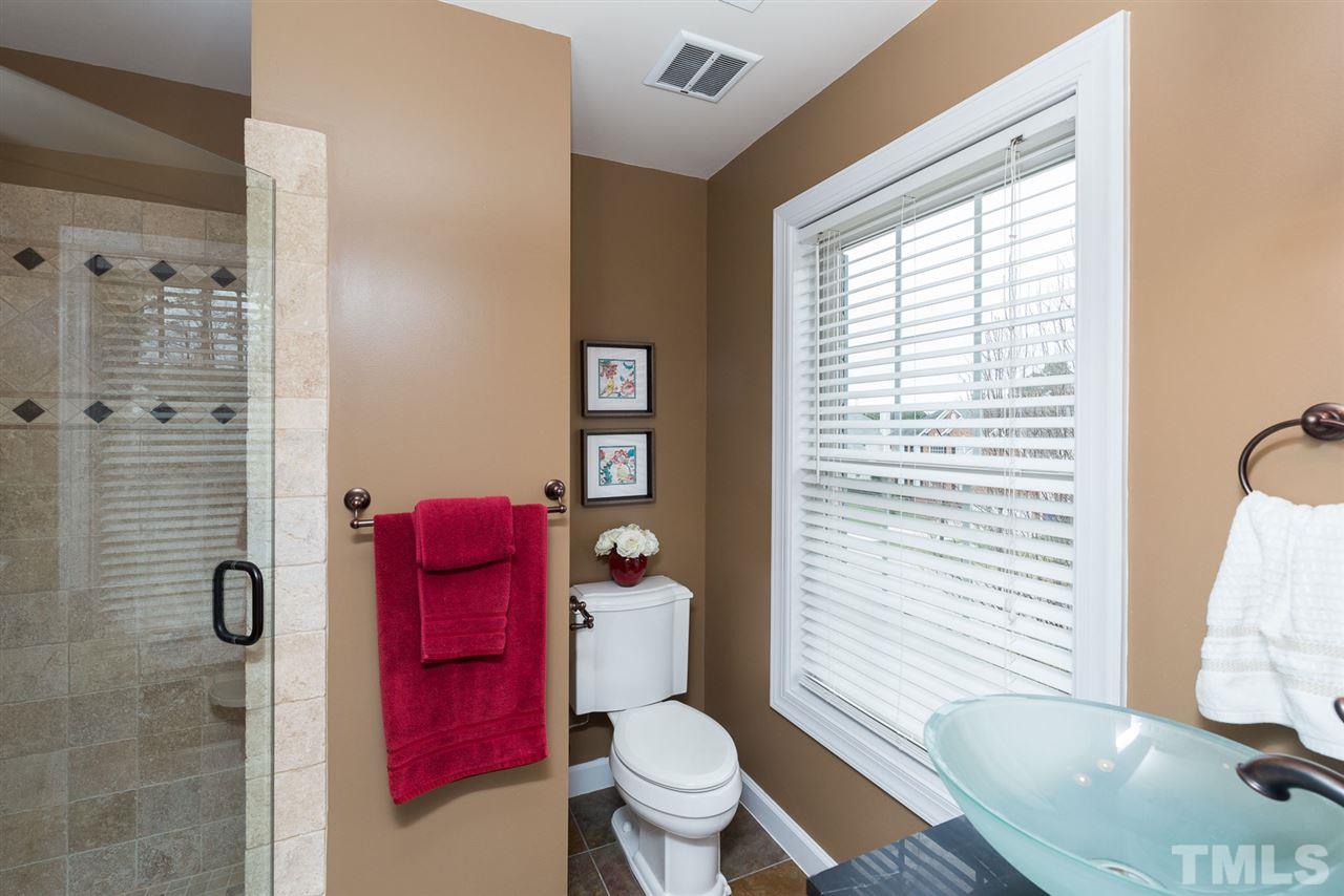 12301 Fieldmist Drive Raleigh, NC 27614 - Photo 22 of 25 The ensuite bathroom. Tiled shower. Perfect.