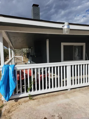 a view of a house with a porch