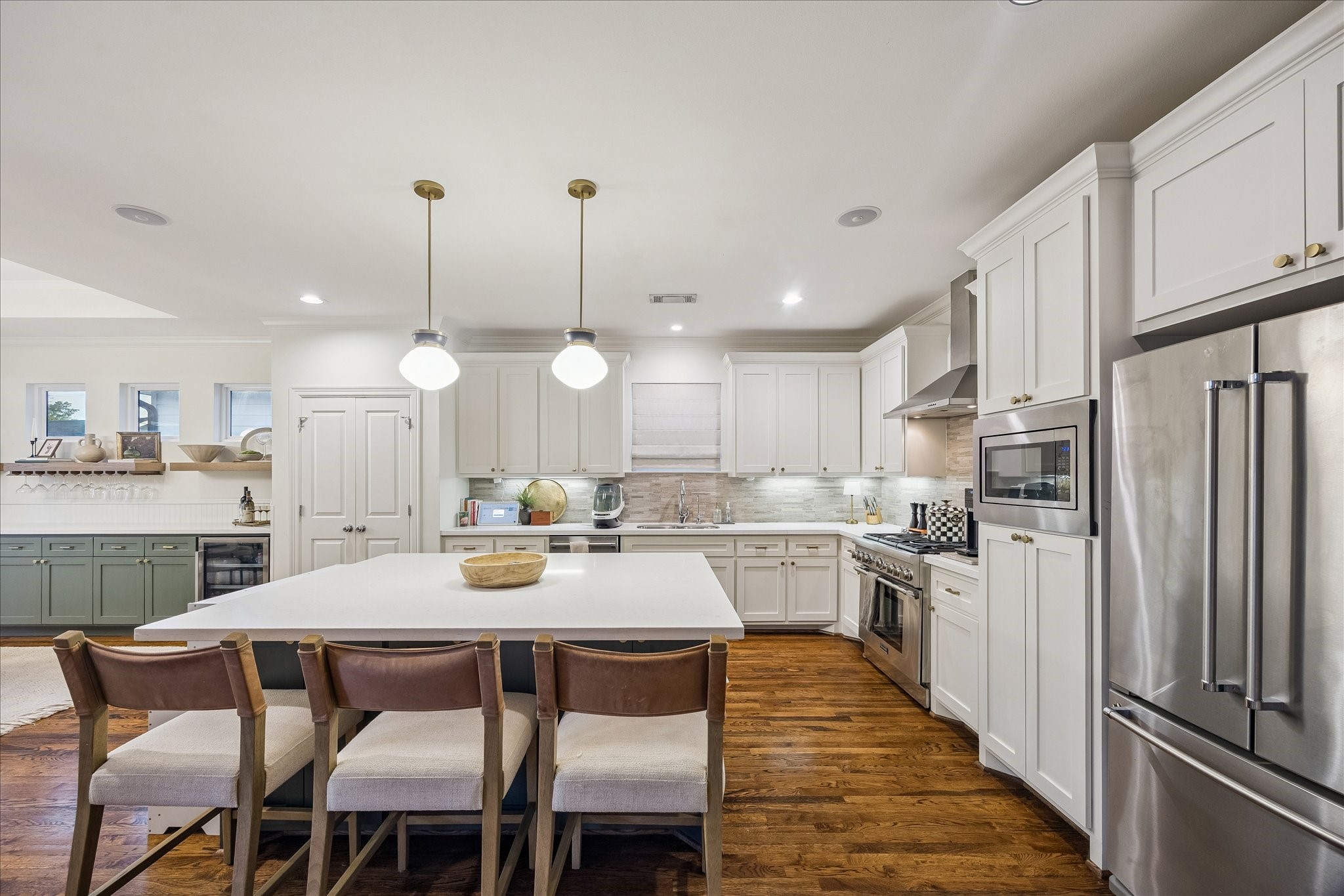 1329 Richelieu Lane Houston, TX 77018 - Photo 8 of 39 Well appointed kitchen features Thermador range, large island and ample counter / cabinet space