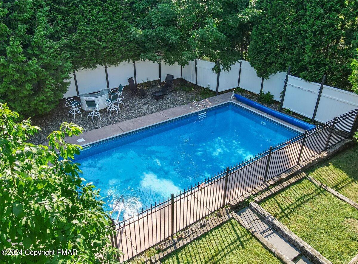 188 Olde Schoolhouse Road Cresco, PA 18326 - Photo 18 of 62 a view of a backyard with sitting area
