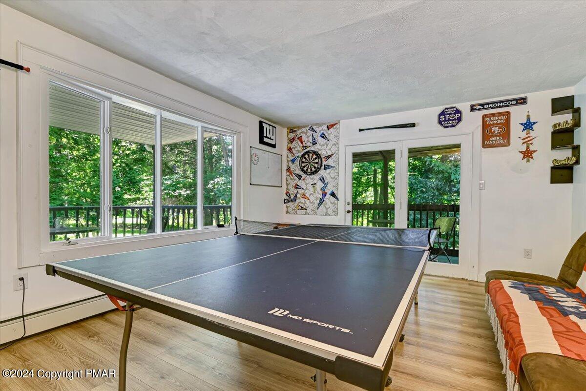 188 Olde Schoolhouse Road Cresco, PA 18326 - Photo 31 of 62 a view of a living room with a large window