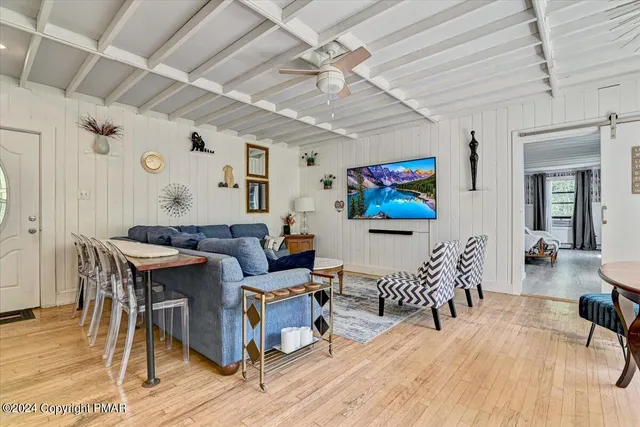 a bathroom with a sink mirror and toilet