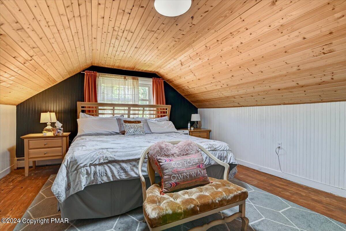 188 Olde Schoolhouse Road Cresco, PA 18326 - Photo 52 of 62 a bedroom with a bed and window