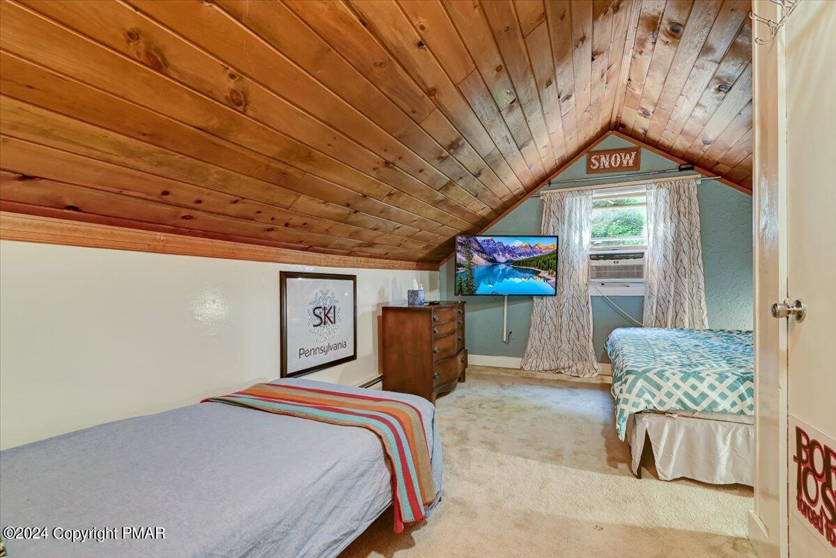 188 Olde Schoolhouse Road Cresco, PA 18326 - Photo 54 of 62 a bedroom with furniture and a window