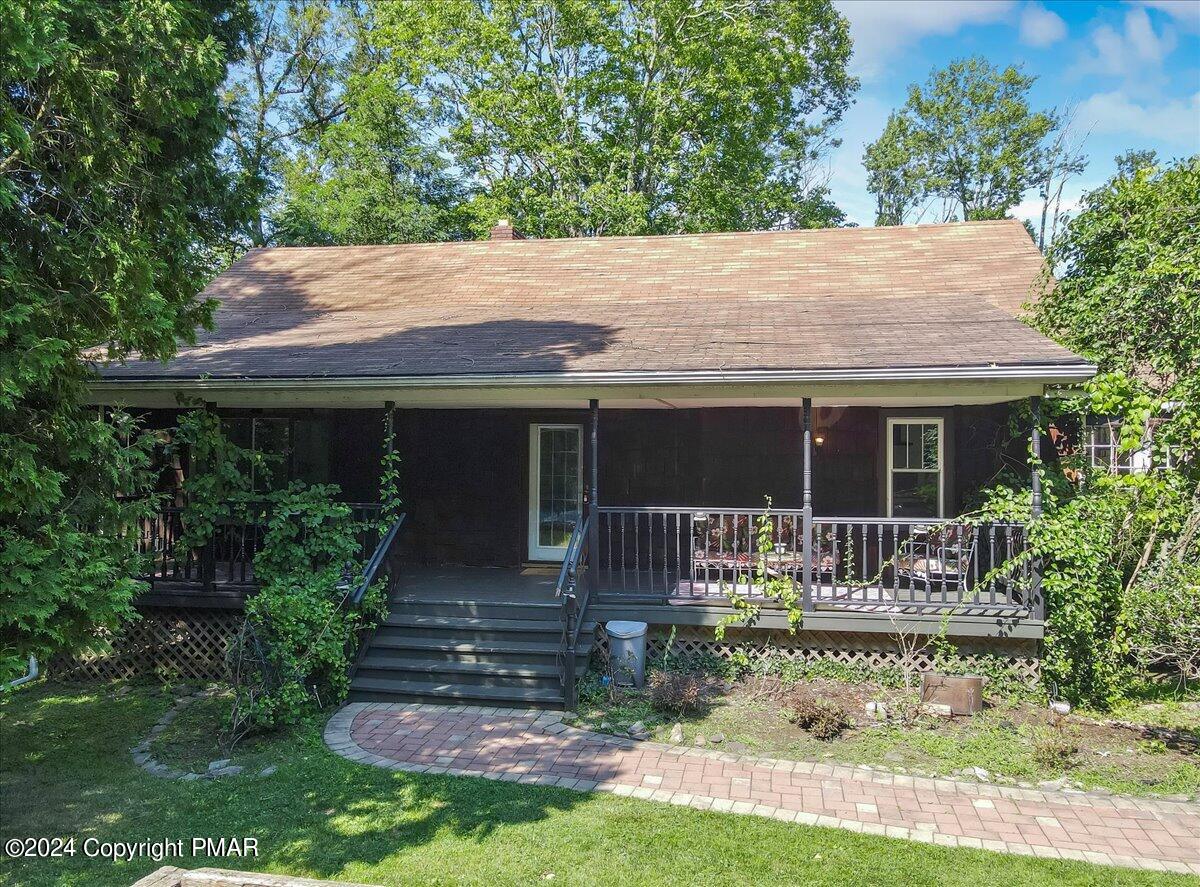 188 Olde Schoolhouse Road Cresco, PA 18326 - Photo 58 of 62 a house view with a garden space