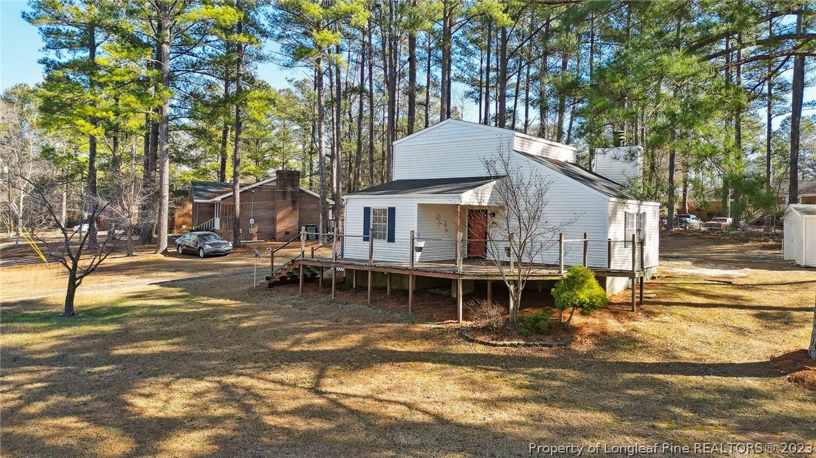 1511 Beaverbrook Road Rockingham, NC 28379 - Photo 2 of 31 a view of a house with pool and sitting area