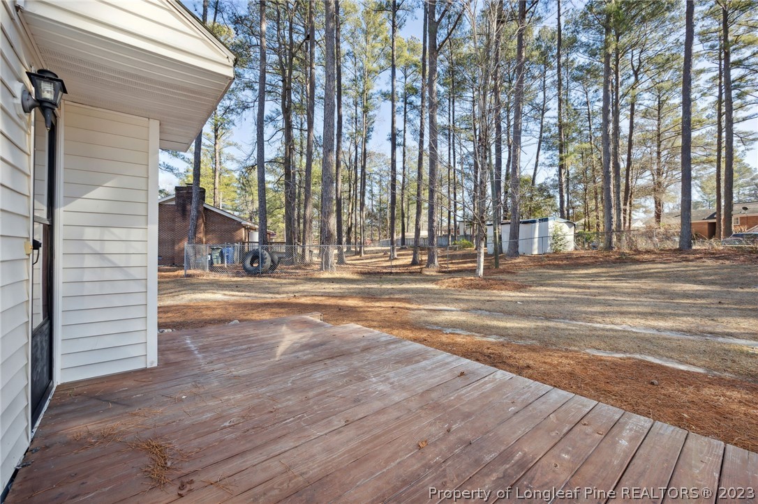 1511 Beaverbrook Road Rockingham, NC 28379 - Photo 23 of 31 a view of outdoor space with deck and tree