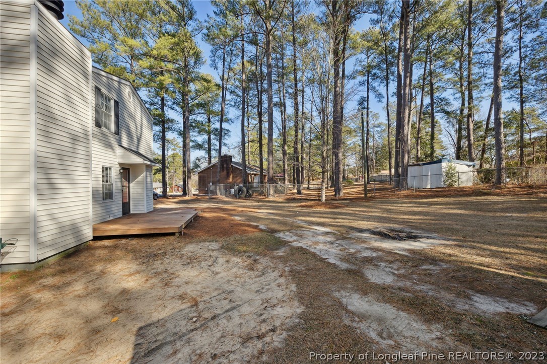1511 Beaverbrook Road Rockingham, NC 28379 - Photo 25 of 31 a view of street with large trees
