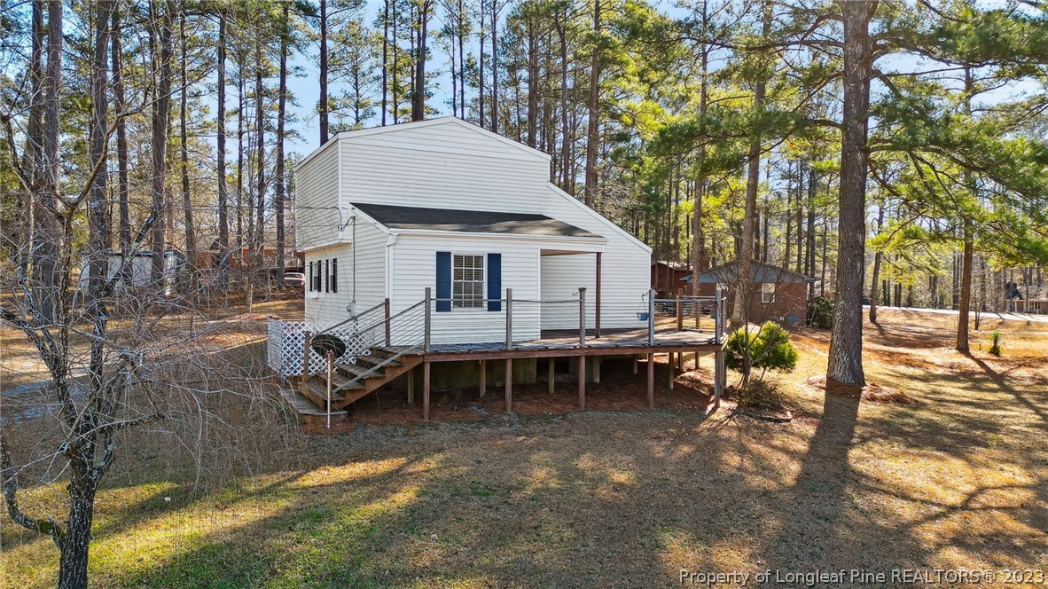 1511 Beaverbrook Road Rockingham, NC 28379 - Photo 3 of 31 a view of a house with backyard and sitting area