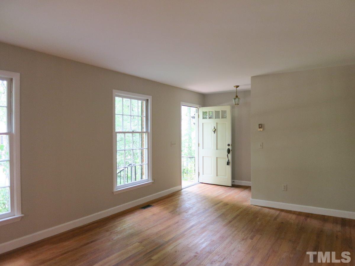 813 Autumn Court Raleigh, NC 27609 - Photo 4 of 25 The spacious formal Living Rm off the Foyer is open to the formal Dining Rm.