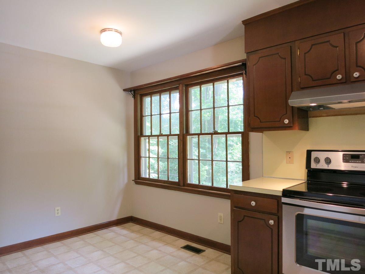 813 Autumn Court Raleigh, NC 27609 - Photo 10 of 25 The Bfast area has double windows overlooking the backyard.