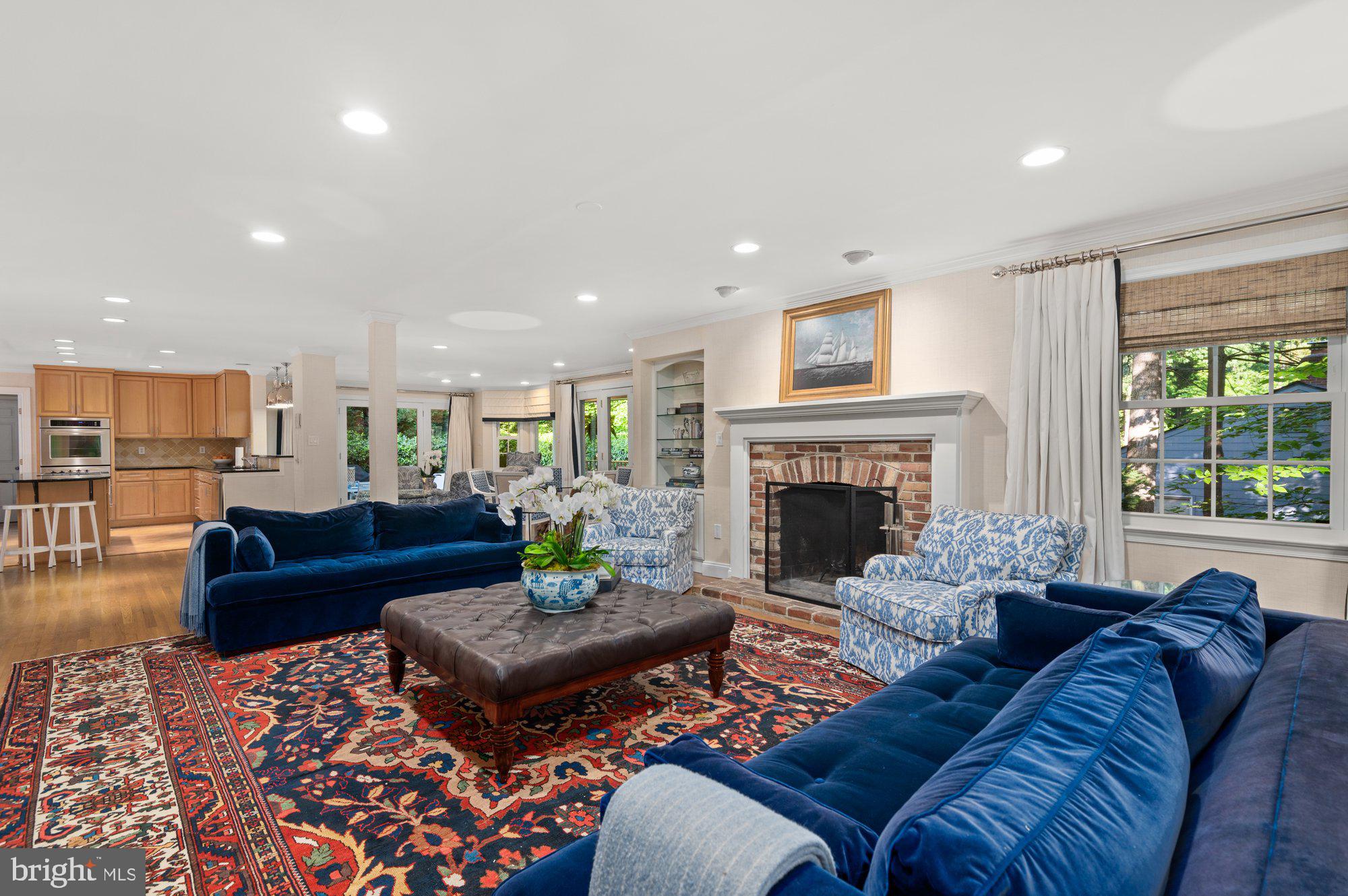 7301 River Falls Drive Potomac, MD 20854 - Photo 12 of 48 Sitting room open to kitchen and informal dining