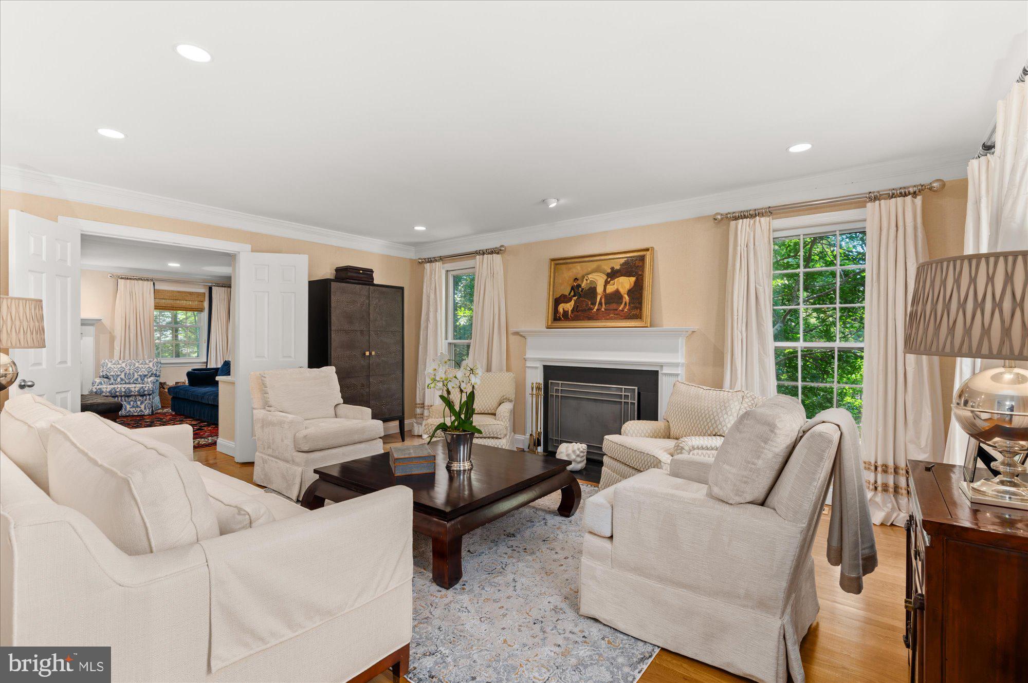 7301 River Falls Drive Potomac, MD 20854 - Photo 6 of 48 Formal living space with fireplace