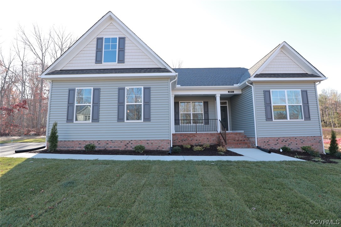 3843 Belspring Road Chester, VA 23831 - Photo 1 of 36 a front view of a house with a yard
