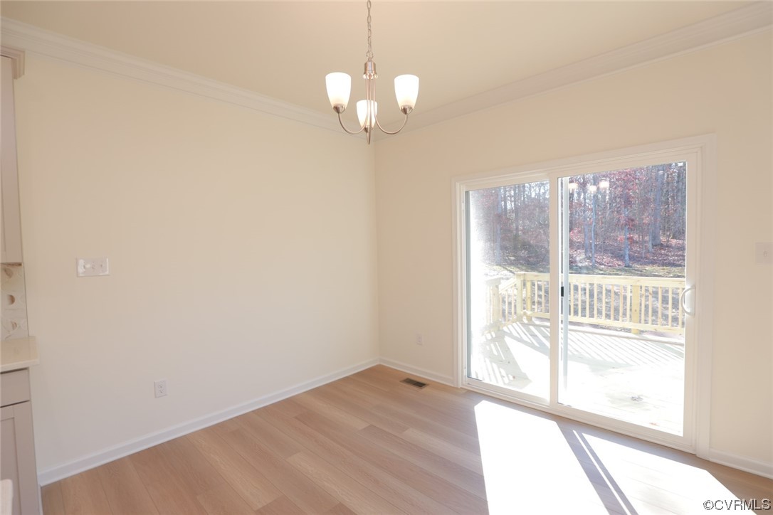 3843 Belspring Road Chester, VA 23831 - Photo 14 of 36 a view of empty room with wooden floor