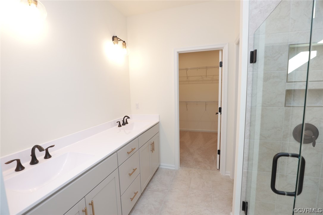 3843 Belspring Road Chester, VA 23831 - Photo 22 of 36 a bathroom with a tub and sink