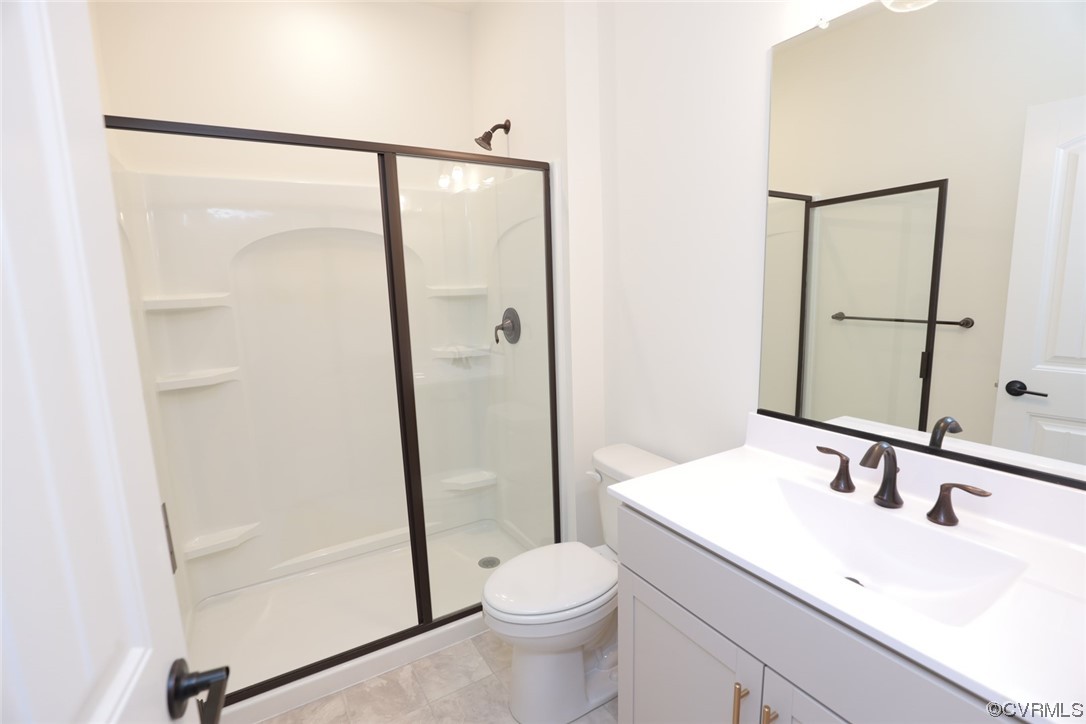 3843 Belspring Road Chester, VA 23831 - Photo 27 of 36 a bathroom with a sink toilet and shower