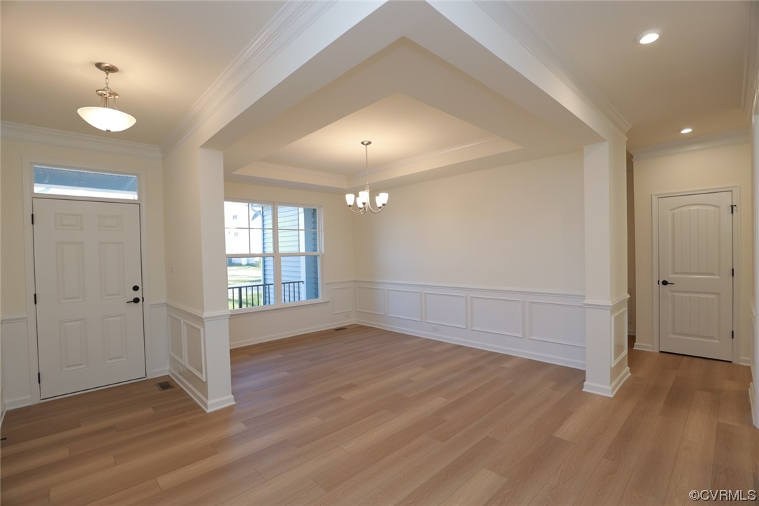 3843 Belspring Road Chester, VA 23831 - Photo 3 of 36 an empty room with wooden floor and windows