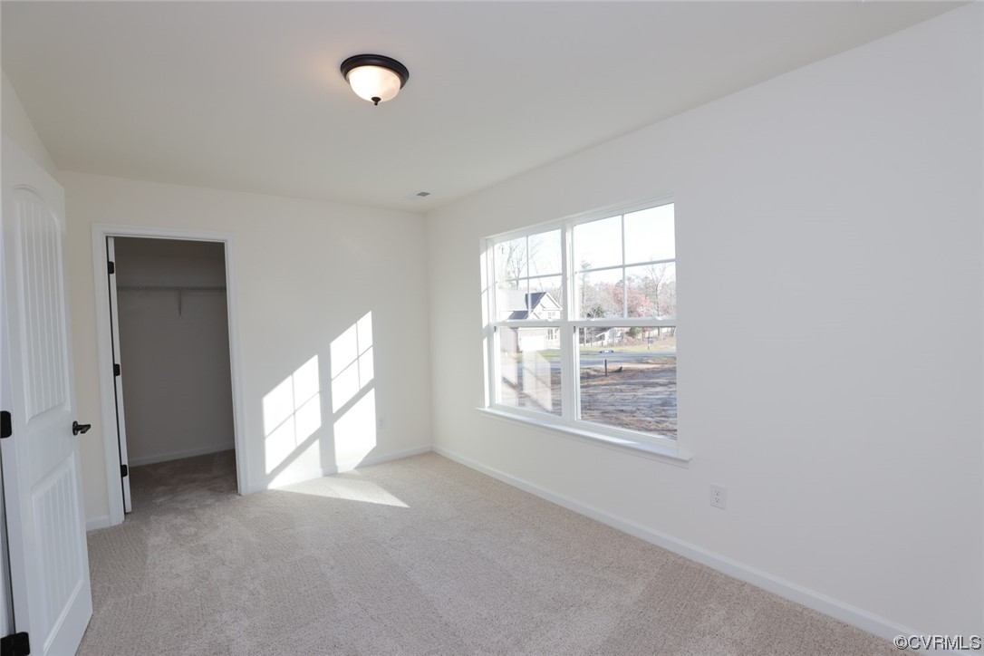 3843 Belspring Road Chester, VA 23831 - Photo 31 of 36 a view of an empty room with a window and bathroom