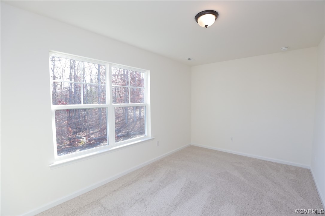 3843 Belspring Road Chester, VA 23831 - Photo 32 of 36 an empty room with a window