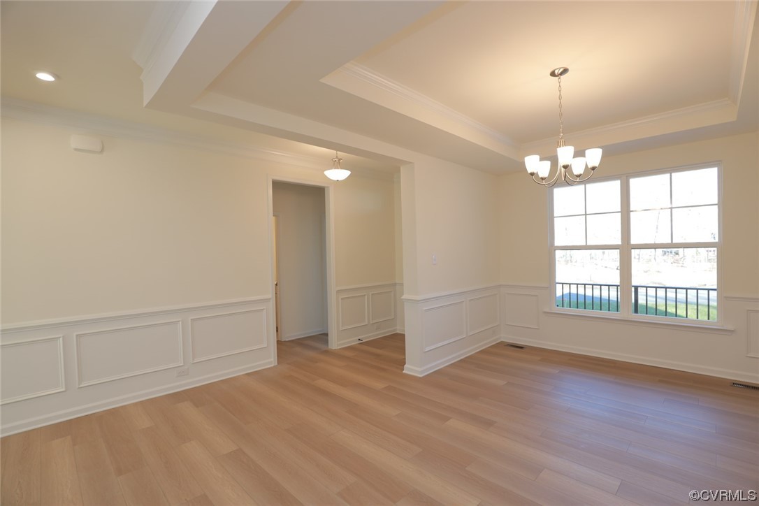 3843 Belspring Road Chester, VA 23831 - Photo 4 of 36 an empty room with wooden floor and windows