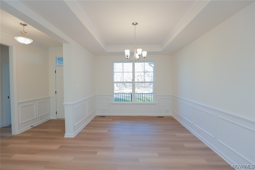 3843 Belspring Road Chester, VA 23831 - Photo 5 of 36 an empty room with wooden floor and windows