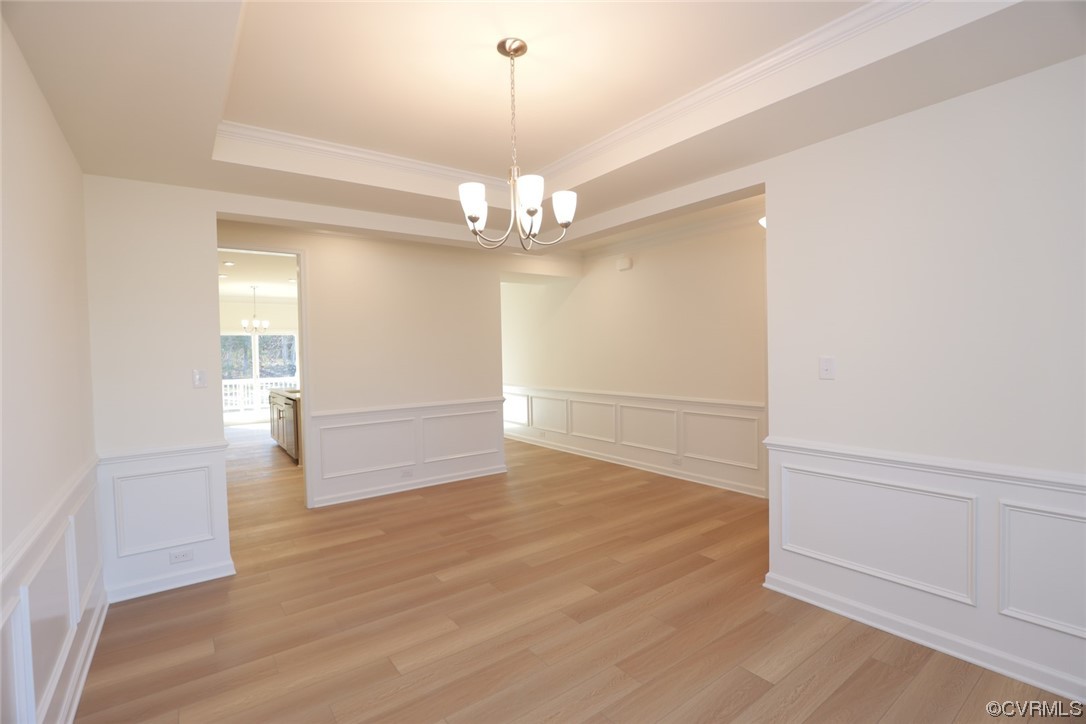 3843 Belspring Road Chester, VA 23831 - Photo 6 of 36 wooden floor in an empty room with a window