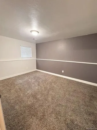 an empty room with an entryway