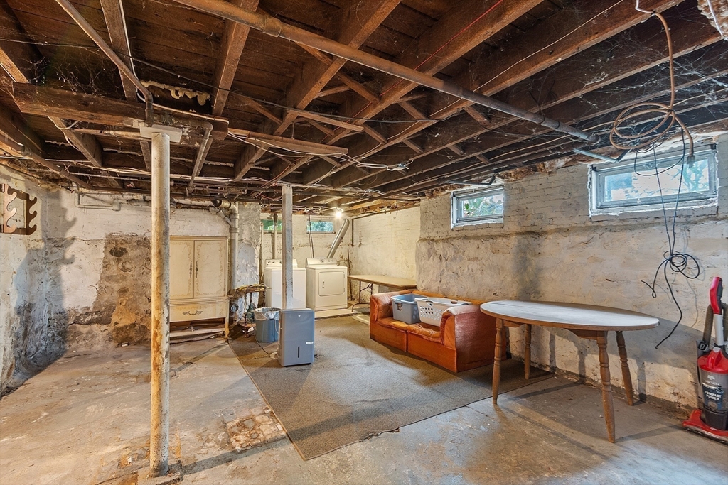 36 Florence Street Everett, MA 02149 - Photo 22 of 26 a view of a room with chairs and a table