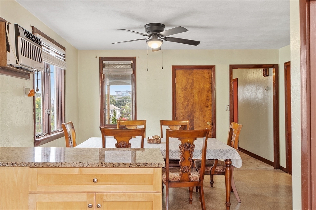 36 Florence Street Everett, MA 02149 - Photo 4 of 26 a view of a livingroom with furniture window and wooden floor