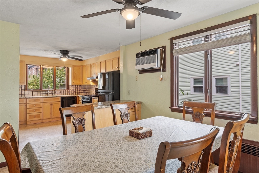 36 Florence Street Everett, MA 02149 - Photo 5 of 26 a view of a dining room with furniture window and outside view