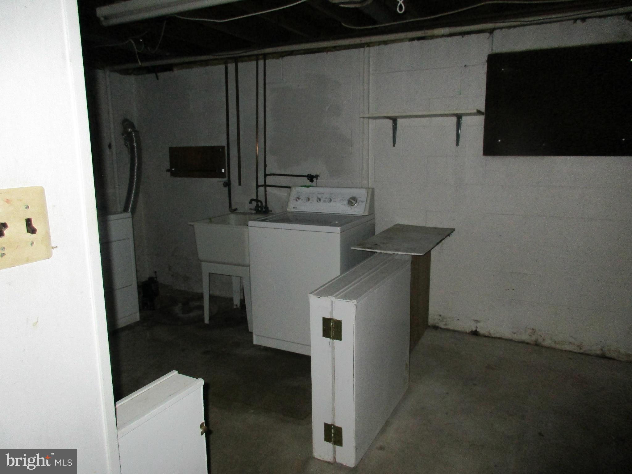 302 Garnett Road Joppa, MD 21085 - Photo 22 of 26 Basement Laundry Area