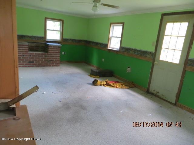 126 Monomonock Road Cresco, PA 18326 - Photo 6 of 9 a view of livingroom with window