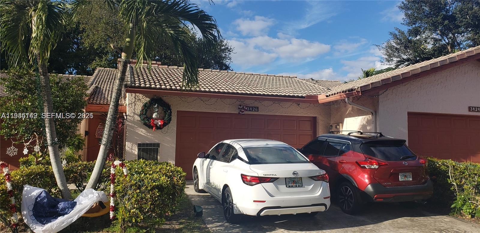 a front view of a house with outdoor space