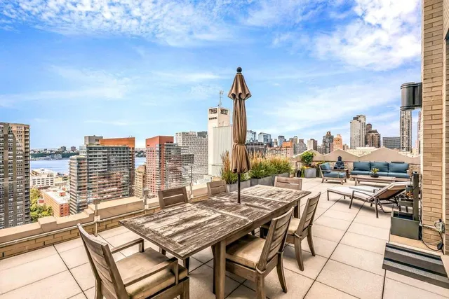 a view of a city with tall buildings