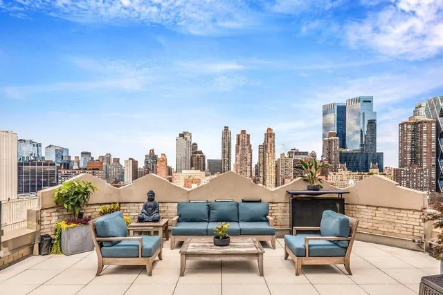 a view of a terrace with furniture