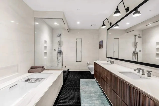 a bed room with a bed and a couch