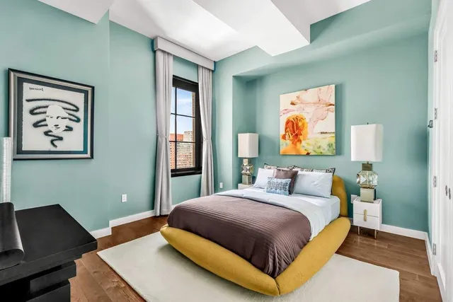 a bathroom with a sink double vanity granite tub shower and a mirror