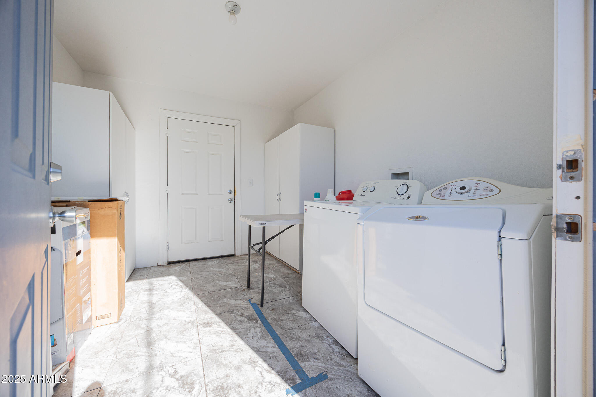 1026 East Pierce Street, Unit B Phoenix, AZ 85006 - Photo 14 of 14 a utility room with dryer and washer